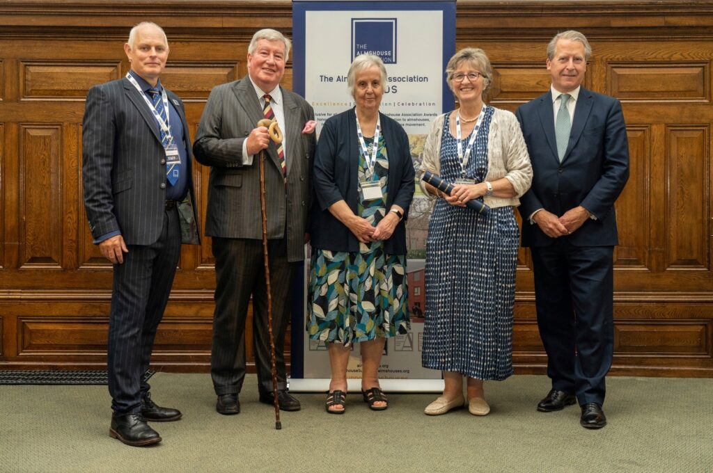 Mary Lester and Sarah Rann receiving the Inspirational Homes Award at the Almshouse Association Members Day 2023